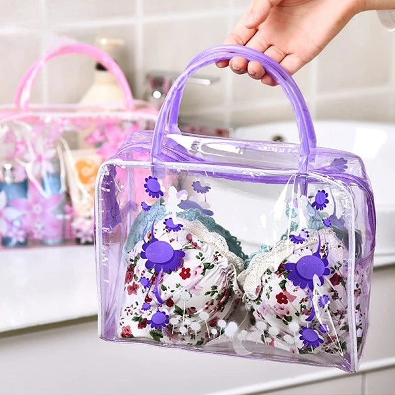 Trousse transparente à pois violets