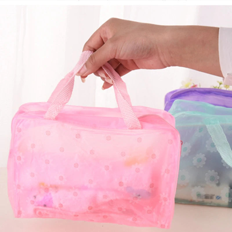 Trousse transparente à pois roses élégante