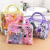 Trousse transparente à pois violets