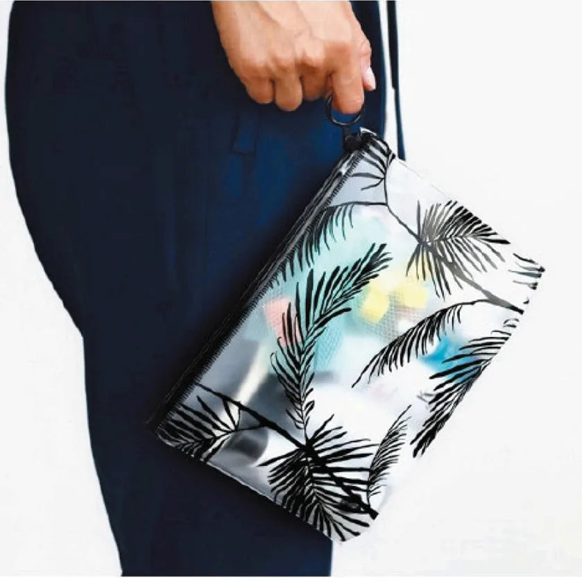 Trousse de toilette transparente motifs palmes