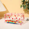 Trousse transparente à cœurs rouges élégante