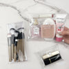 Pochette maquillage transparente chic