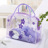 Sac de voyage transparent pois roses
