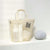 Trousse de toilette transparente suspendue - modèle Beige - TransparenceSac.com