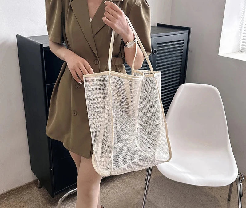 Sac de plage en filet transparent rose